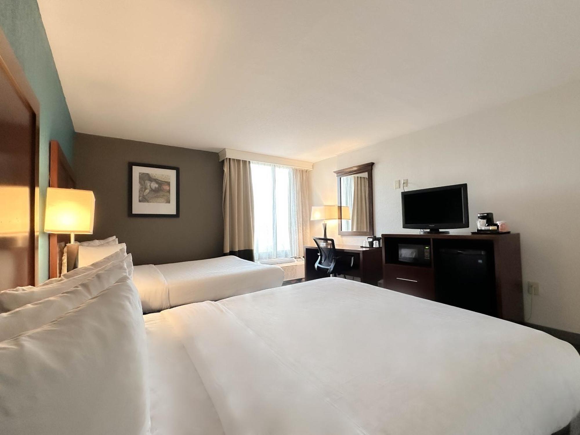 Deluxe Queen Room with Two Queen Beds with Sofa Bed